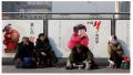 2014年3月2日，北京火车站前的一处标语牌。（图片来源：Lintao Zhang/Getty Images）