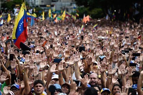 我们只有一项明确的行动：保持团结，坚定追求一个民主、自由的委内瑞拉